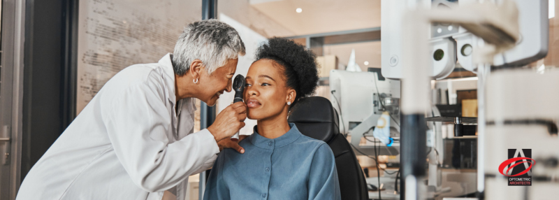 Eye doctor looking closely and providing patient with an eye exam