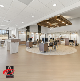 Interior of newly designed optometry office with oak, brown, and white color scheme